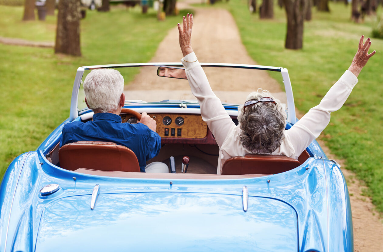 Rearview shot of a senior couple out on a road trip on a sunny day